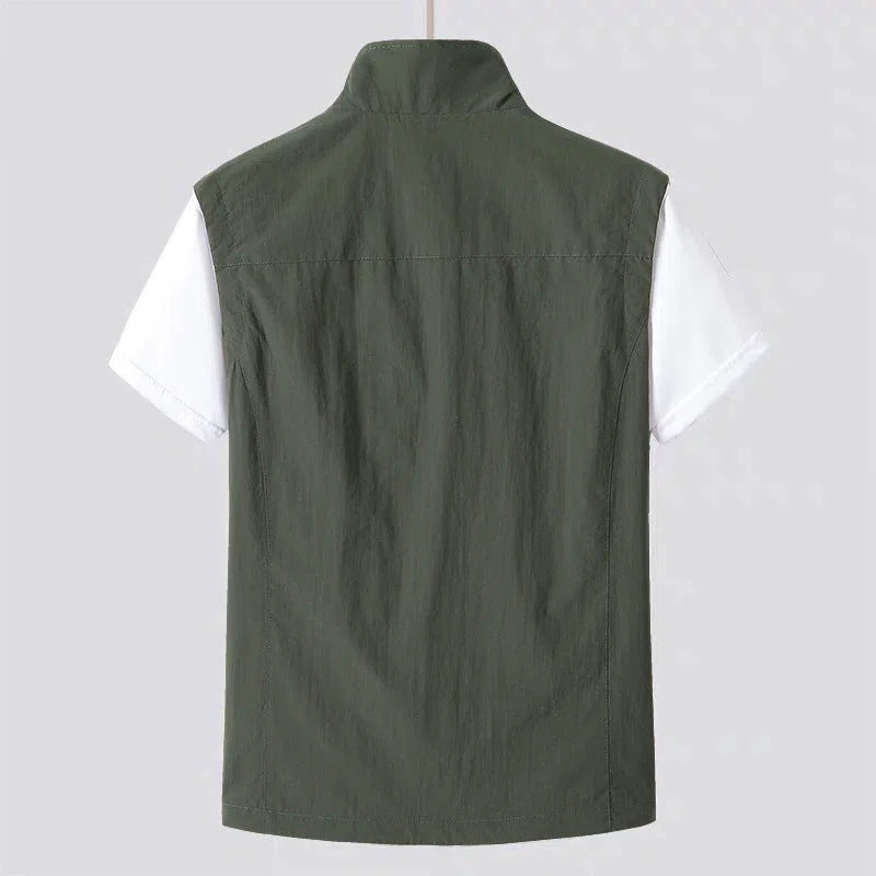 Sleeveless multi-pocket outdoor vest jacket in army green, gray, khaki or dark blue, slim fit, unhooded, sizes M-4XL.