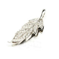 Silver metal USB flash drive shaped like a crystal maple leaf on a white background.