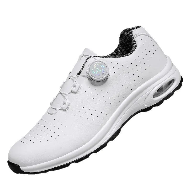 Black and white low top casual tennis shoes with cross shoulder straps and mesh upper.