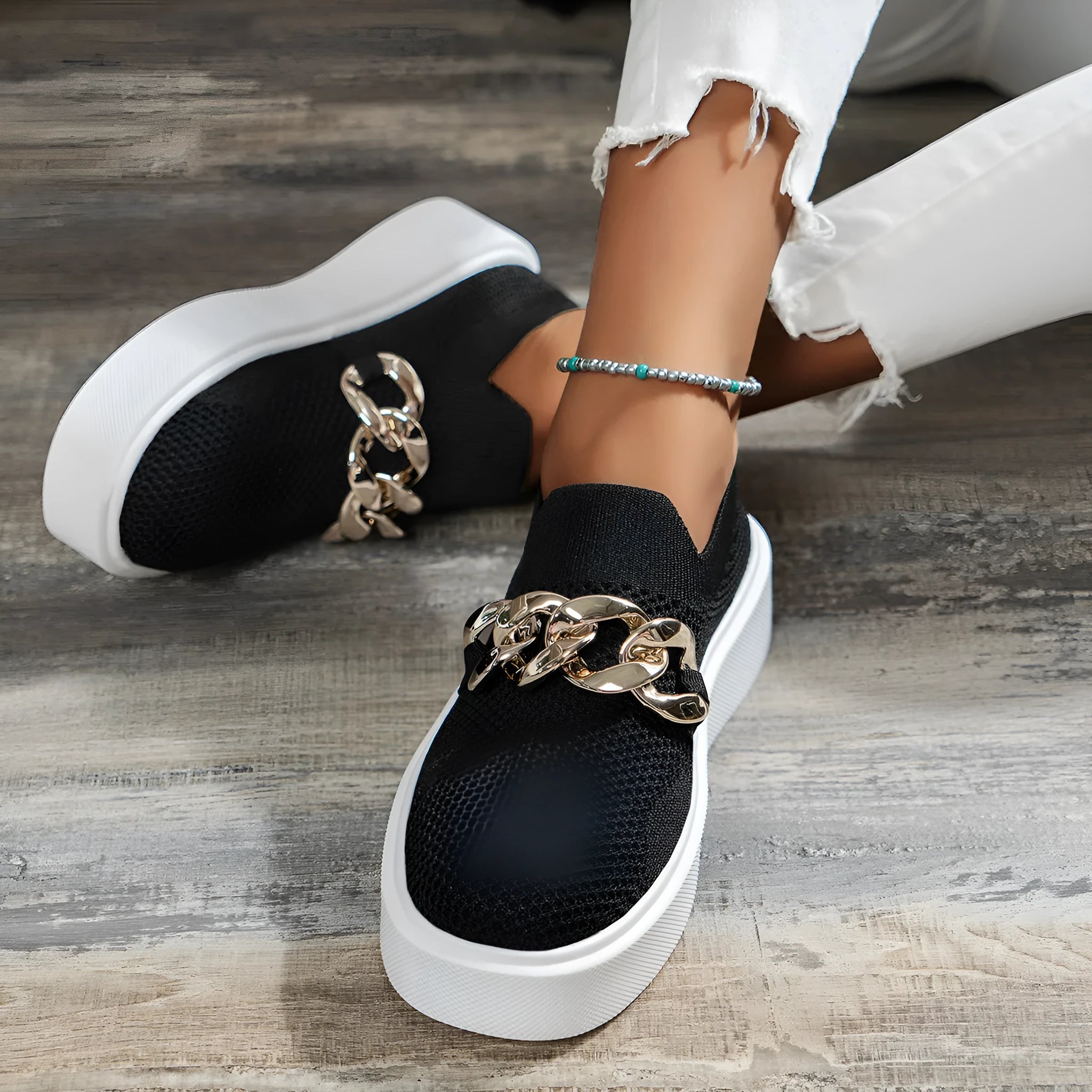 Women's breathable mesh chain flats with low heel, black colour, round toe, and EVA sole