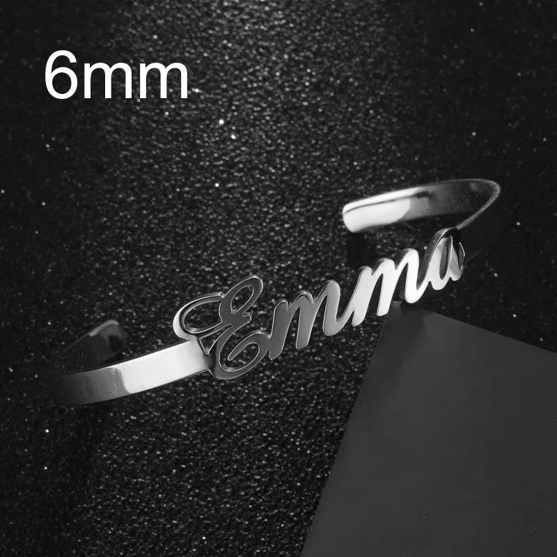 Customized name bracelet in stainless steel with silver, gold, or rose gold finish and 3mm, 6mm, or 10mm size options.