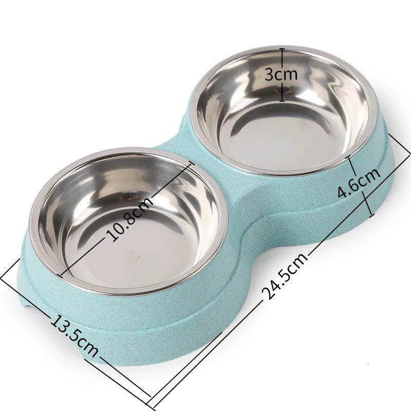 Round two-in-one dog bowl with straw in blue, green, and pink colours measuring 24.5 x 13.5 x 4.6 cm