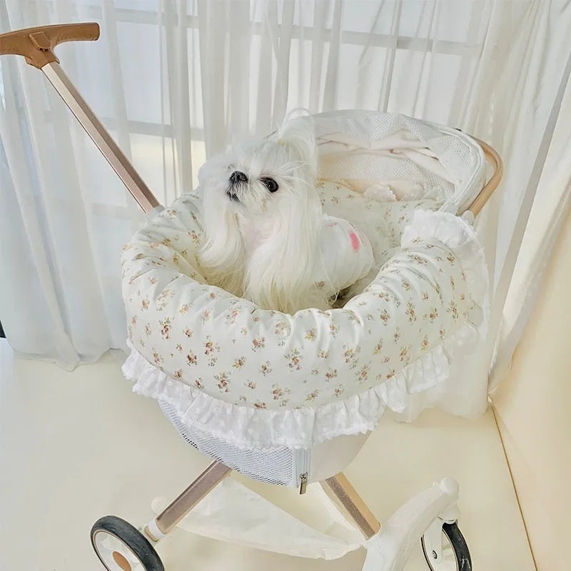 Pure cotton pet stroller three-piece set showing removable anti-dirty towel, cushion, and pillow in a floral pattern.