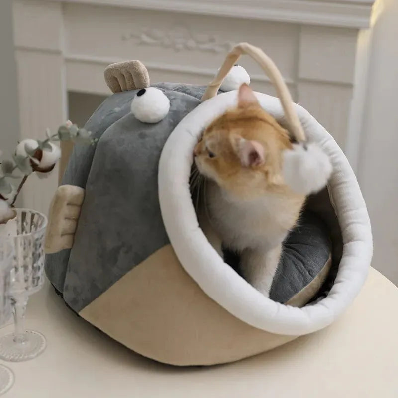 Grey semi-closed lantern fish shaped cat bed made of soft deerskin velvet, showing front opening.