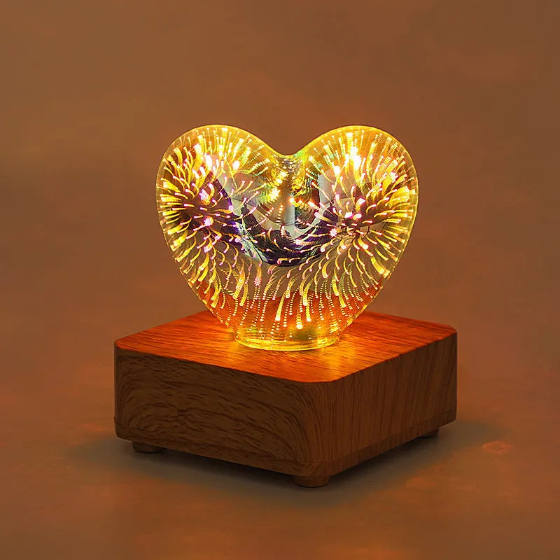 3D love glass small night lamp with silver electroplated finish and solid wood base on a bedside table