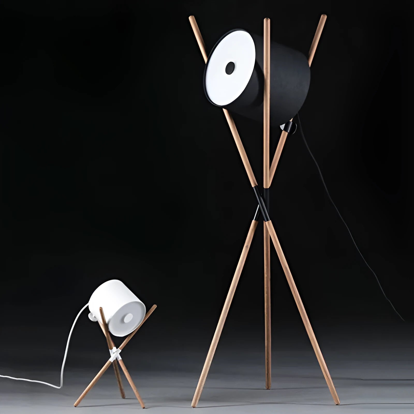 Modern three fork floor lamp with wooden stand and acrylic shade in a living room setting.