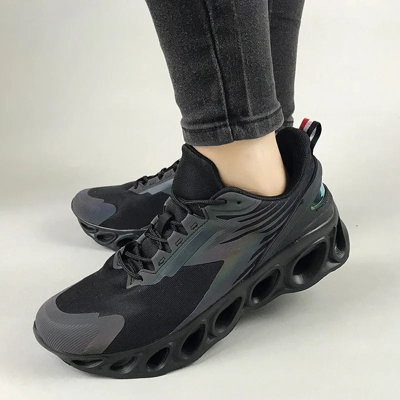 Men's low-top casual sports shoes in black with mesh upper and lace-up front.