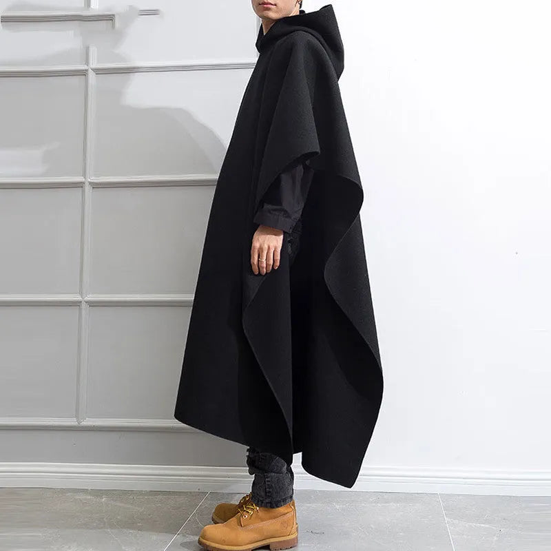 Men's black hooded cloak coat with loose punk streetwear design, front view