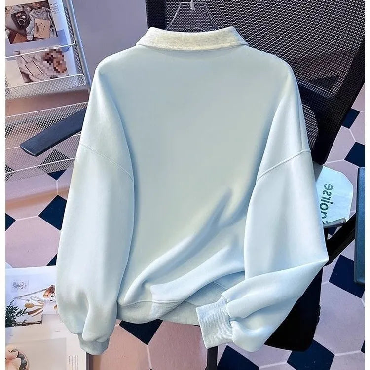 Women's fake two-piece sleeveless sweater top with tie polo collar and plush fabric, blue or gray, cropped length.