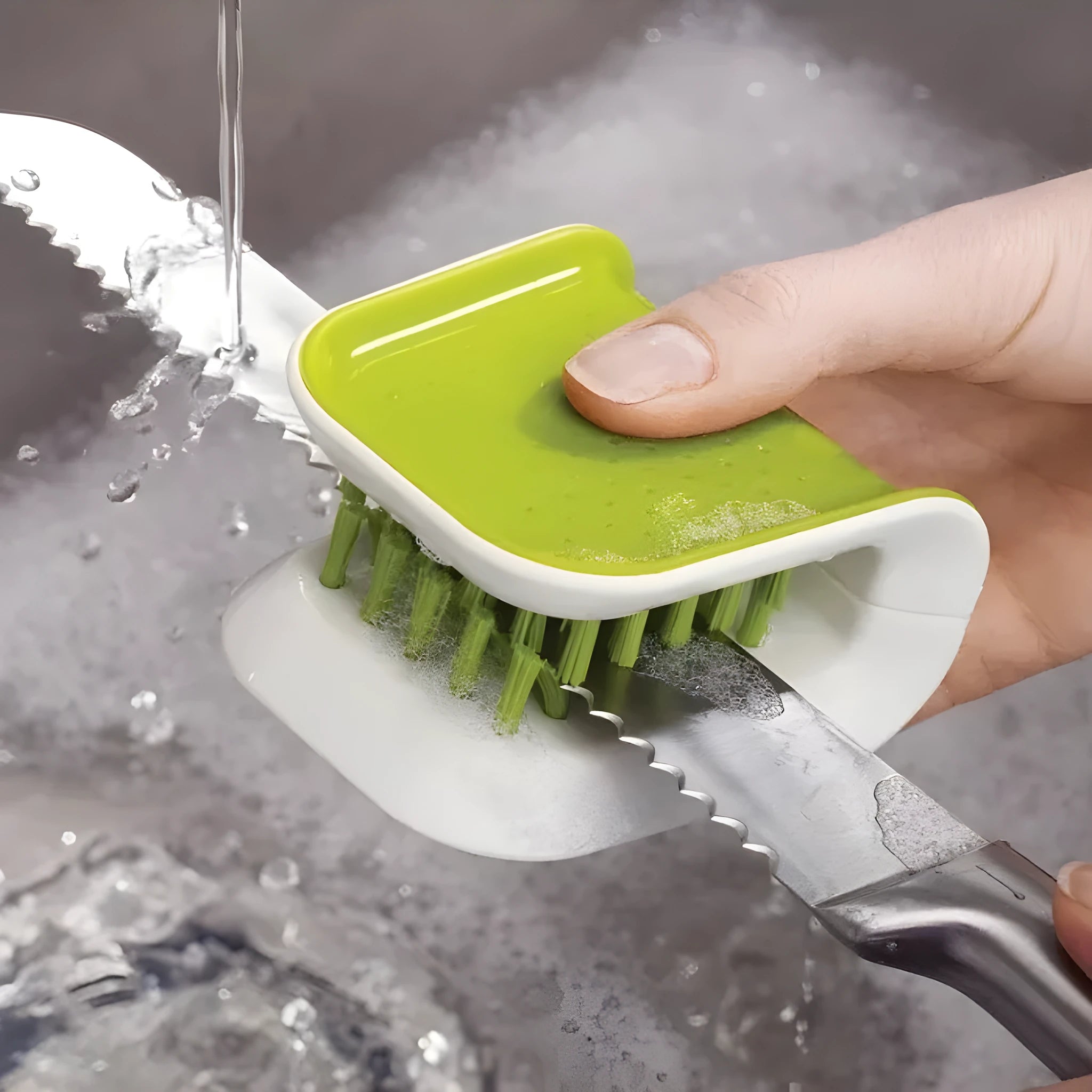 Blue U-shaped plastic brush for cleaning kitchen knives and forks on a draining board.