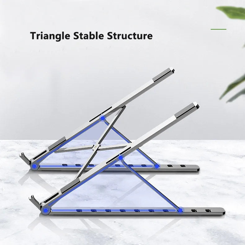 Foldable aluminium laptop stand in silver with silicone pads and cable management slot for 7-15 inch laptops