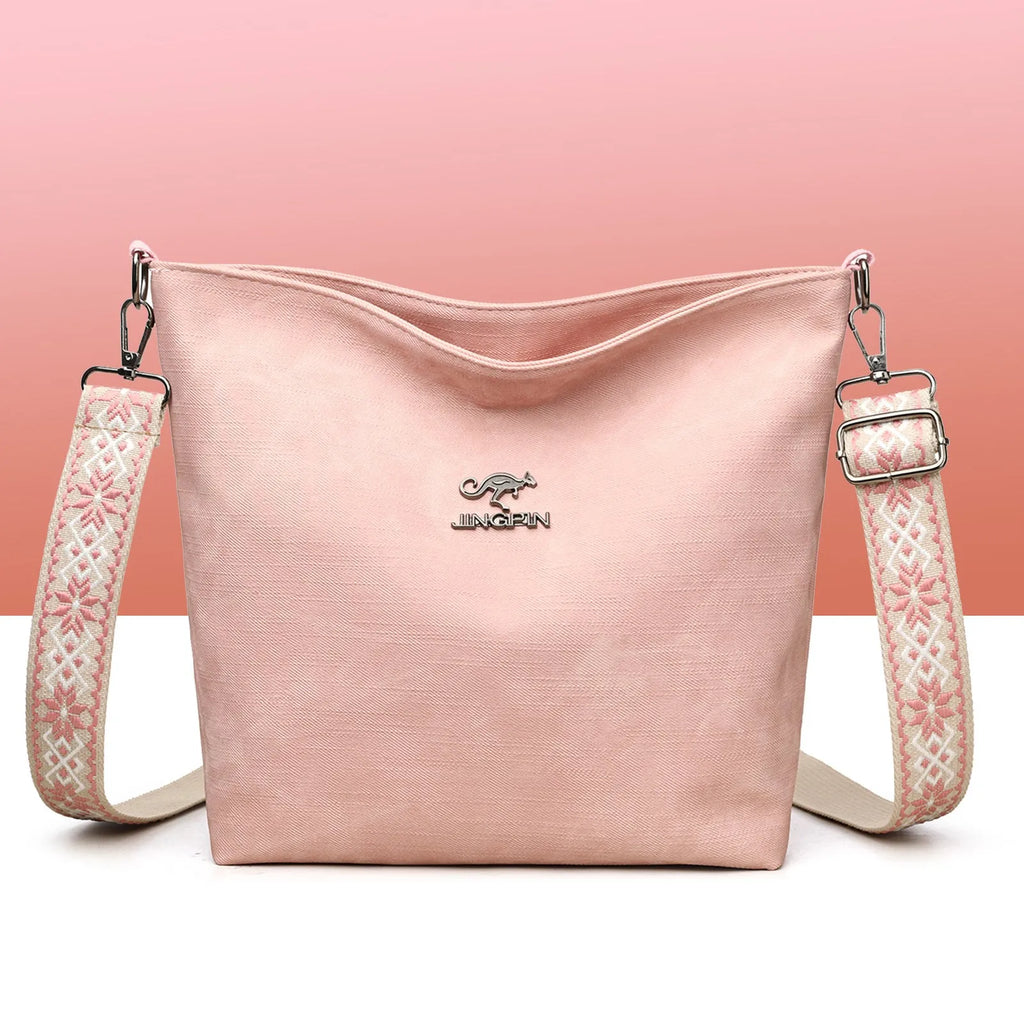 Soft PU leather crossbody shoulder bag in pink colour with large main compartment and single strap