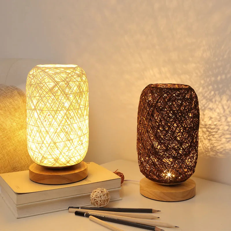 Brown hemp rope sphere desk lamp with wooden base on a desk