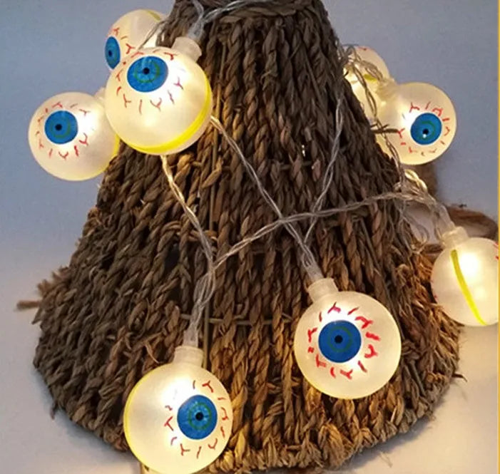 Halloween pumpkin and ghost LED string lights with battery pack and multiple pendant designs