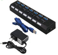 7-port USB 3.0 external hub in black with power adapter, compact size 165x34x15mm, LED indicators