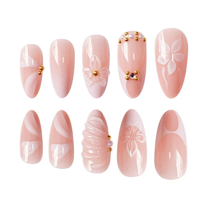 White almond fake nails with three-dimensional water ripple finish and flower pattern in colour AA214