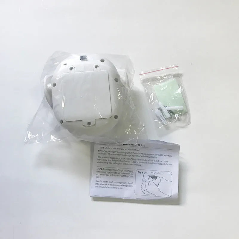 White atomic angel induction lamp with ABS plastic construction measuring 13.3×9.8×15.8cm