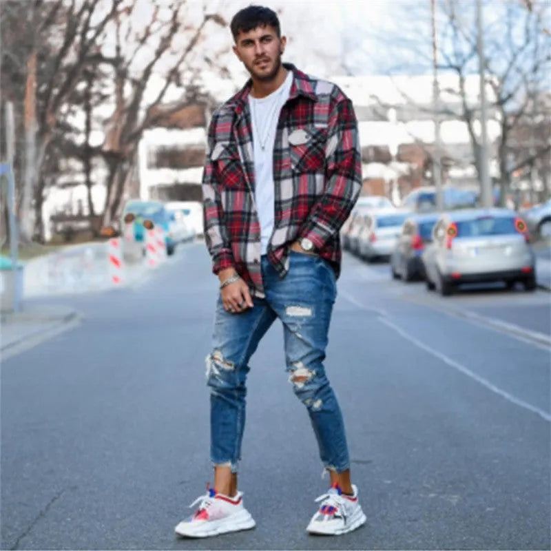 Men's distressed blue jeans with hole detailing in cotton fabric
