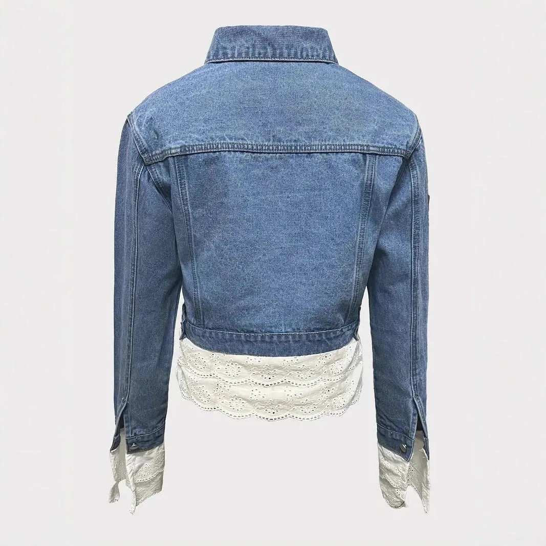 Blue women's denim jacket with lace stitching detail on the front, showing long sleeves.