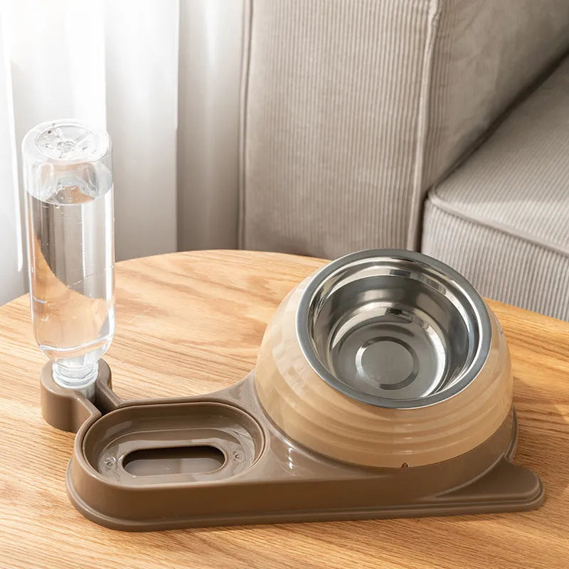 Brown elevated cat food bowl with attached water bottle dispenser on a white background.