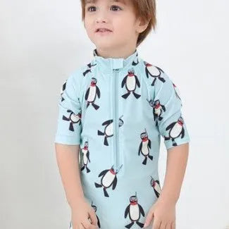 Boys' penguin print swimming costume set with long sleeves and matching swimming cap