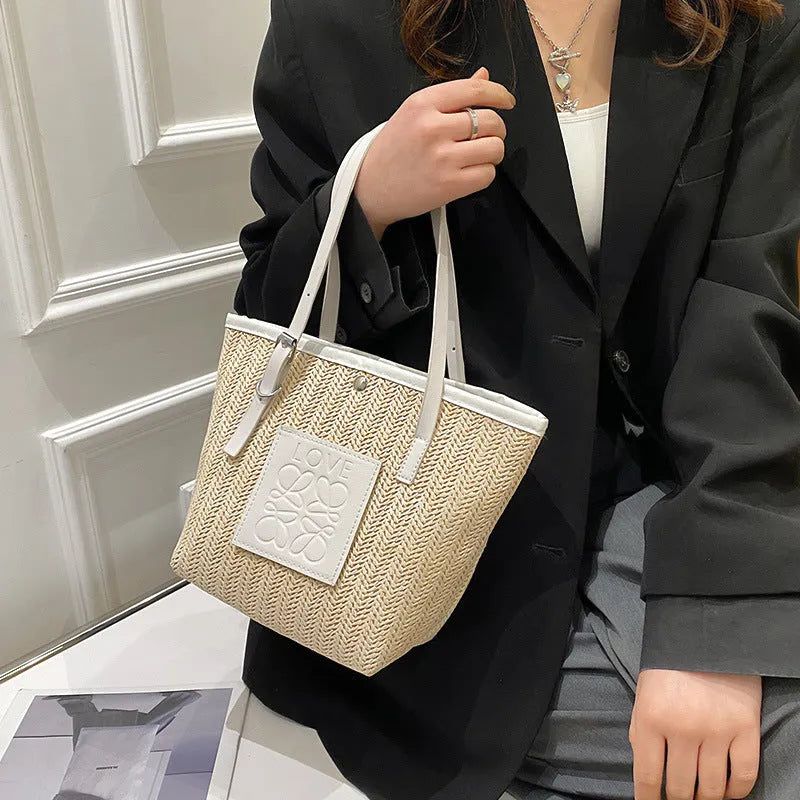 Straw woven large capacity shoulder bag with PU trim and retro styling