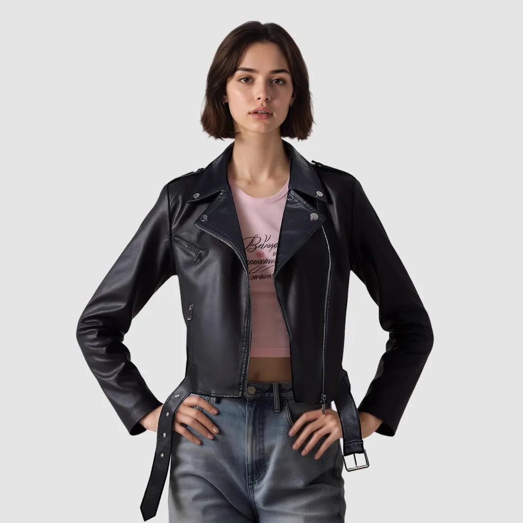 Women's short black PU leather biker jacket with an adjustable waist belt, shown on a model.