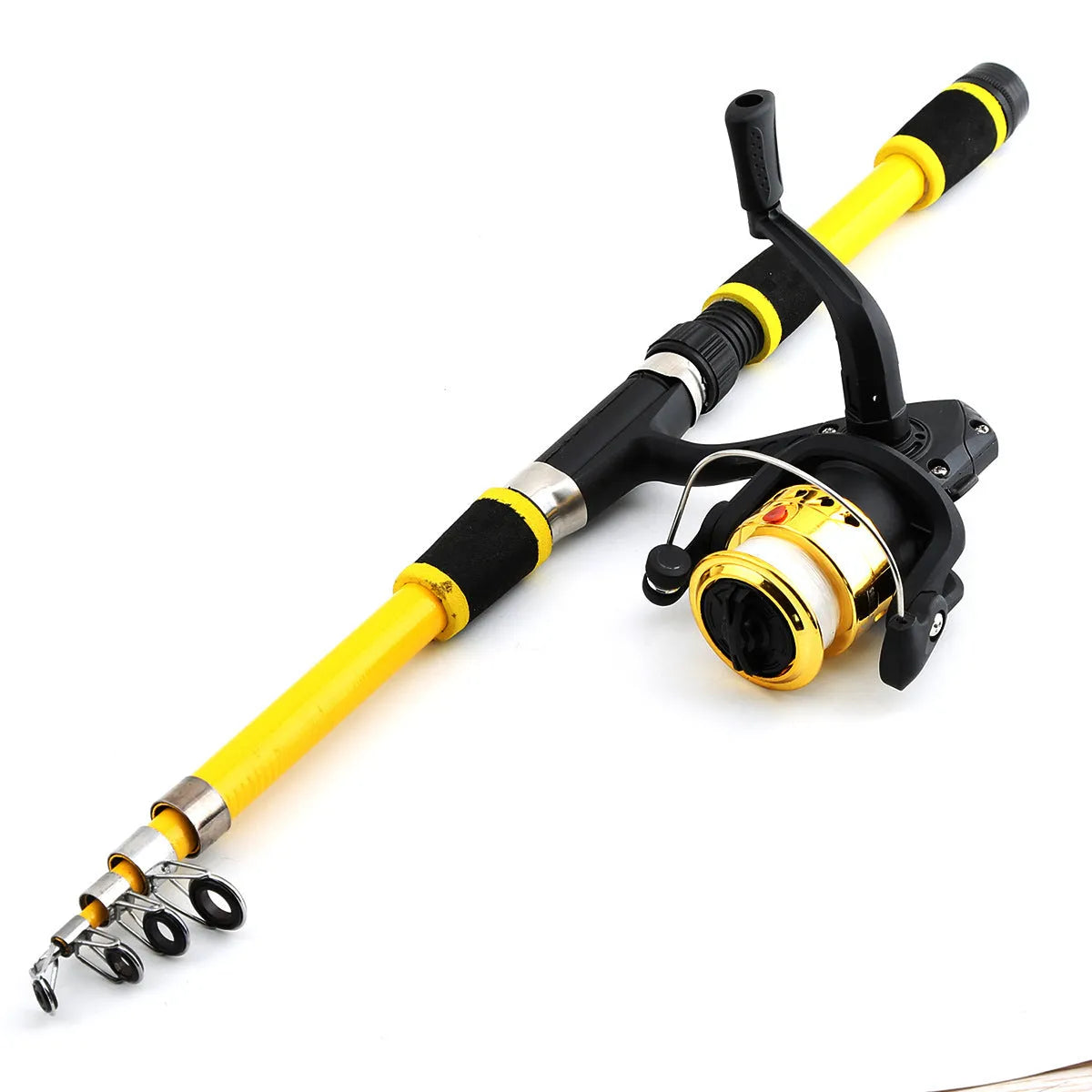 Blue children's fishing rod and reel set with matching tackle box on a grassy bank.