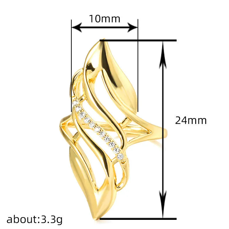 Women's exaggerated curve statement ring in gold colour with bold design on finger