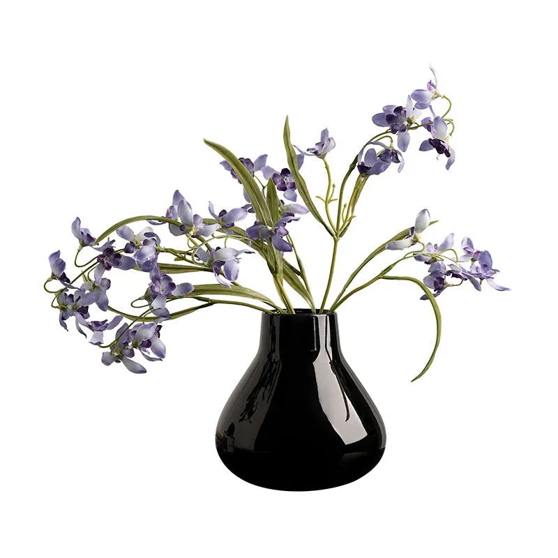 Black ceramic round belly vase with glass surface and coloured glaze decoration