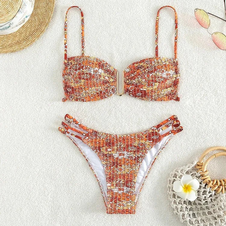 Women's high-waisted floral bikini swimsuit set in a solid colour with a briefs design.