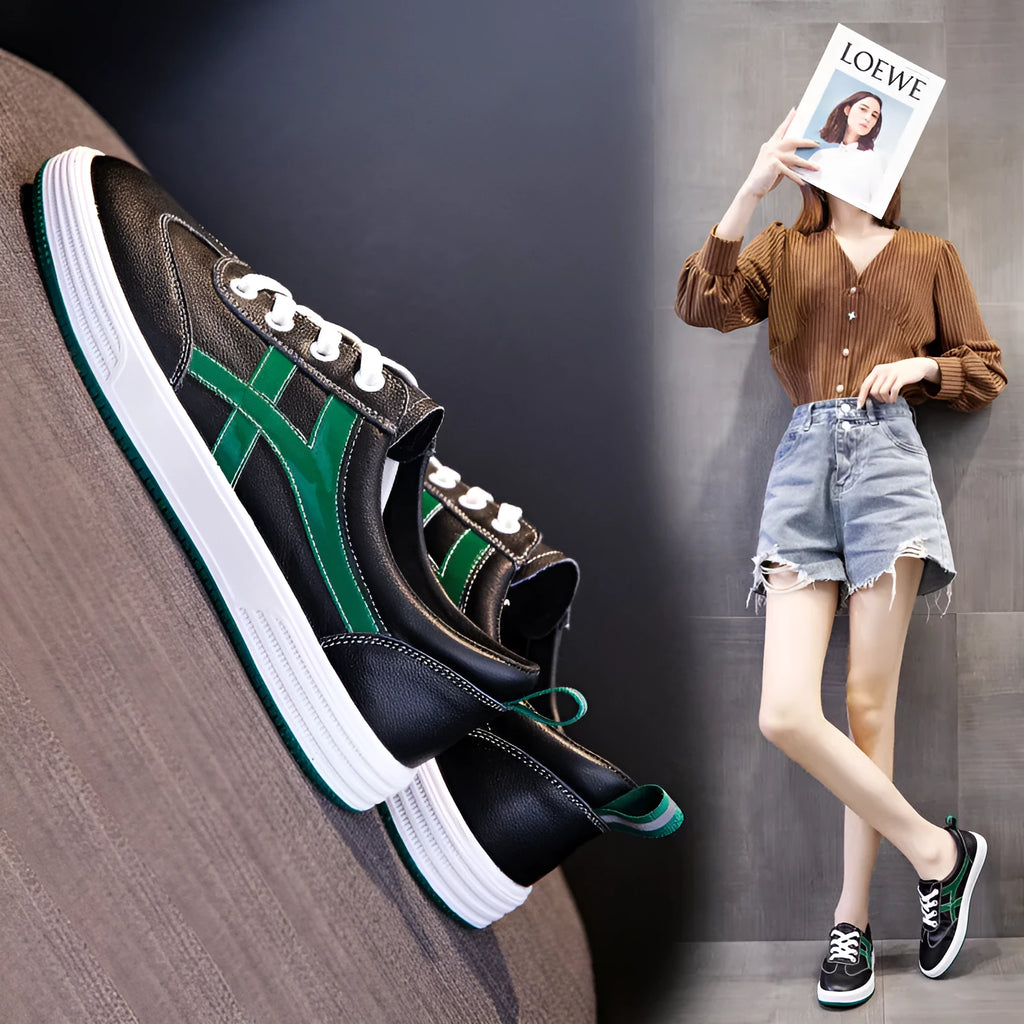 Women's white and black leather sneakers with elastic band closure and round toe