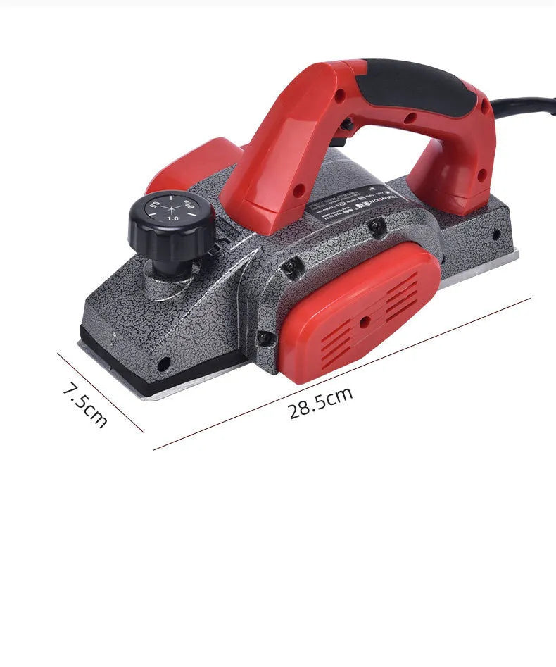 Red aluminium-shell electric wood planer with 82mm planing width and 1400W motor for carpentry tasks.