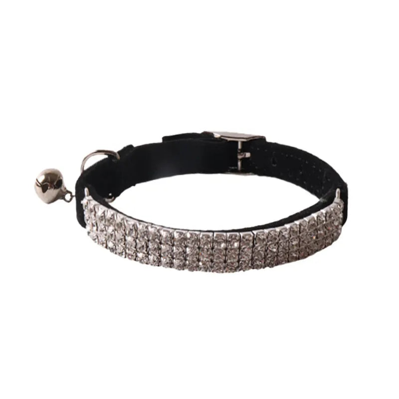 Flocked fabric cat collar with elastic buckle and gang drill pattern in multiple colours.
