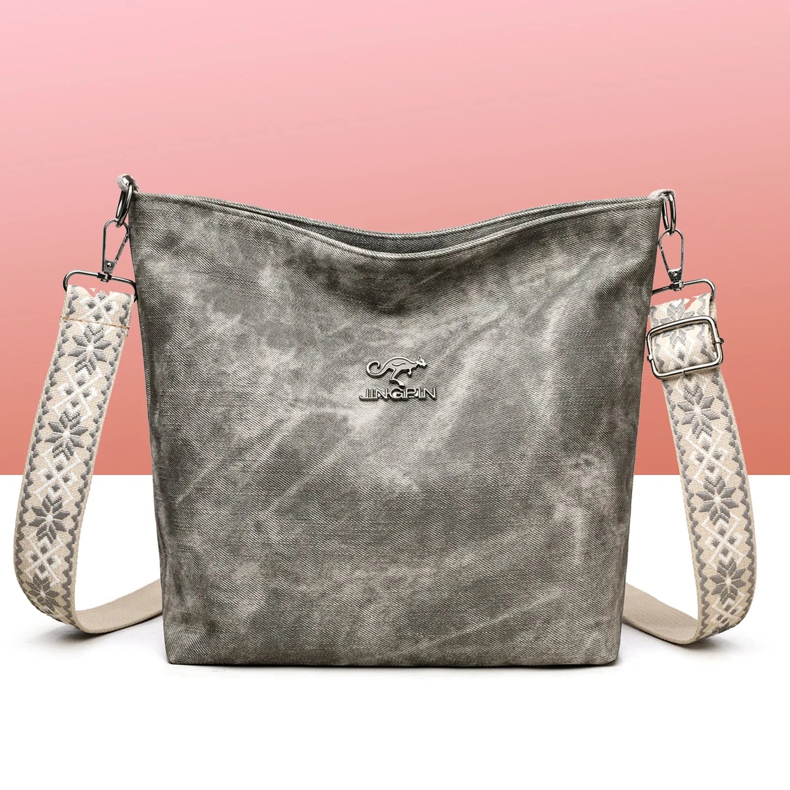 Soft PU leather crossbody shoulder bag in pink colour with large main compartment and single strap