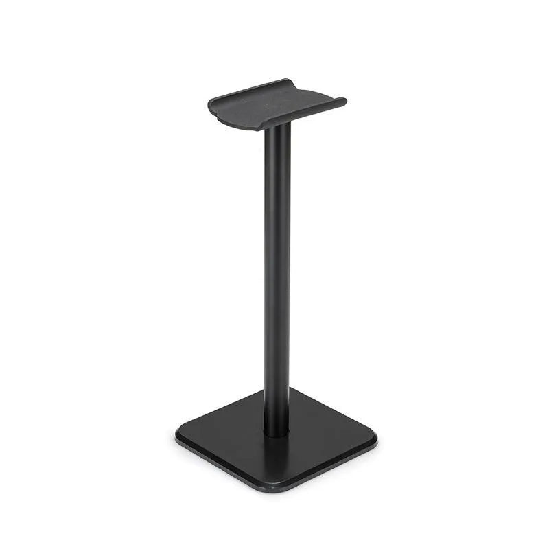 Detachable aluminium alloy headset hanger display shelf with elastic TPU rubber cradle, in white, on a desk