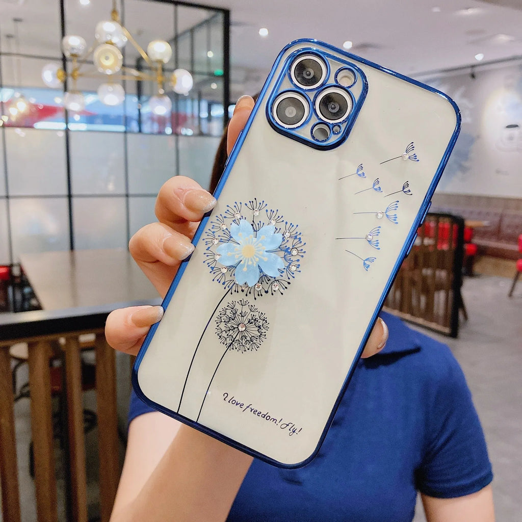 Green iPhone case with a built-in 3D white flower stand popped out, showing the phone propped up for viewing.
