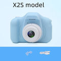 X2 HD mini cartoon kids digital camera in silicone body with 2-inch screen and strap.