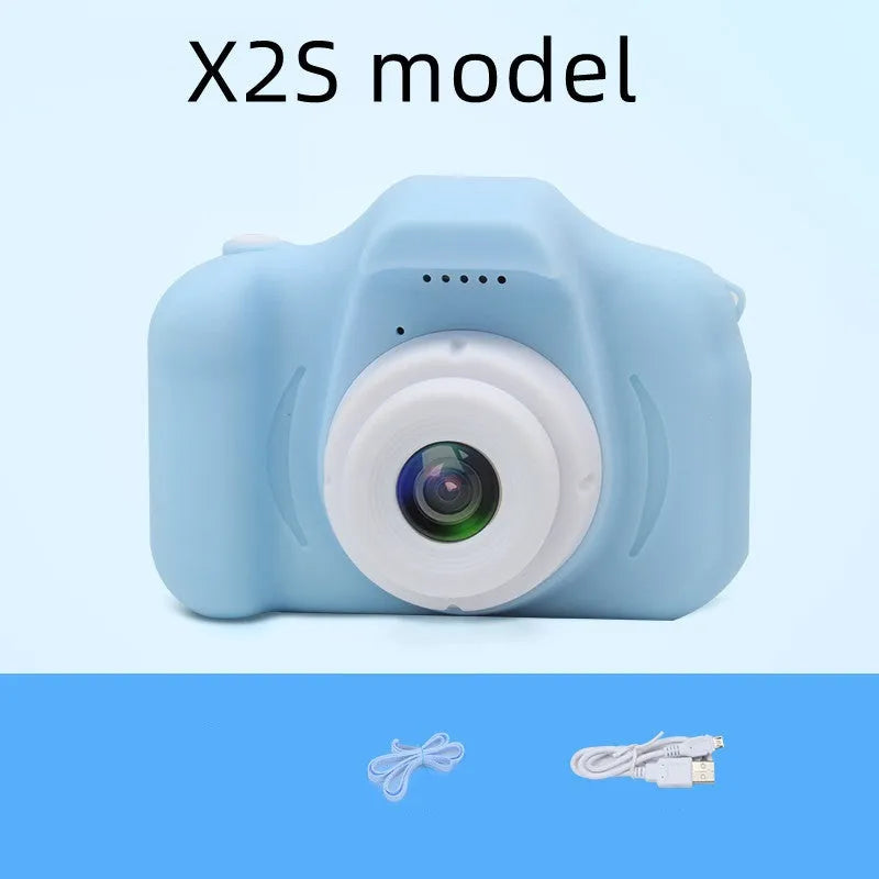 X2 HD mini cartoon kids digital camera in silicone body with 2-inch screen and strap.