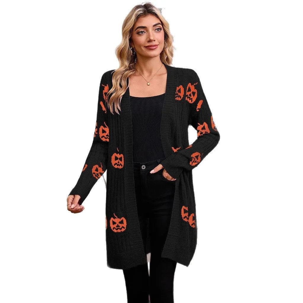 Women's black cardigan with orange pumpkin head jacquard pattern, open front, regular sleeves.
