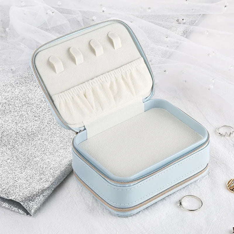Simple zipper PU leather jewelry box in light blue with compact 11.5cm size and metal zipper closure