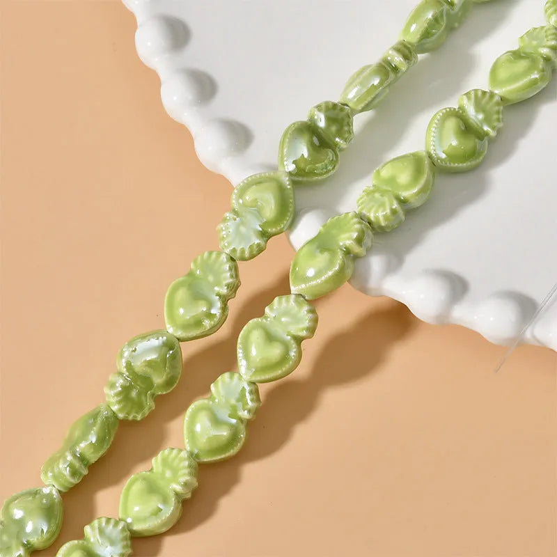 Ceramic love heart small torch beads in multiple colours for jewellery making with straight holes