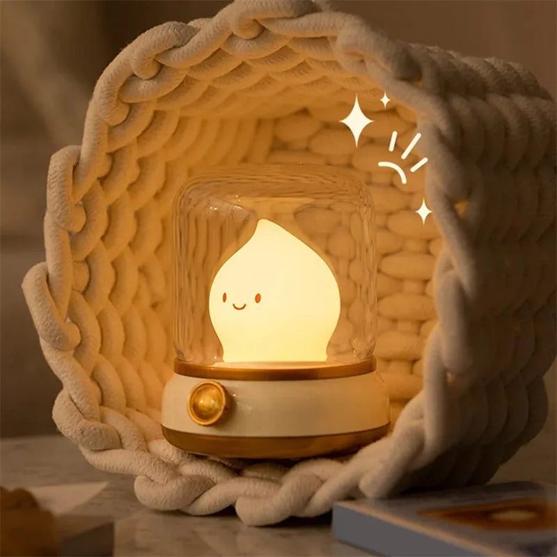 Green retro USB rechargeable desk lamp with adjustable knob on wooden table