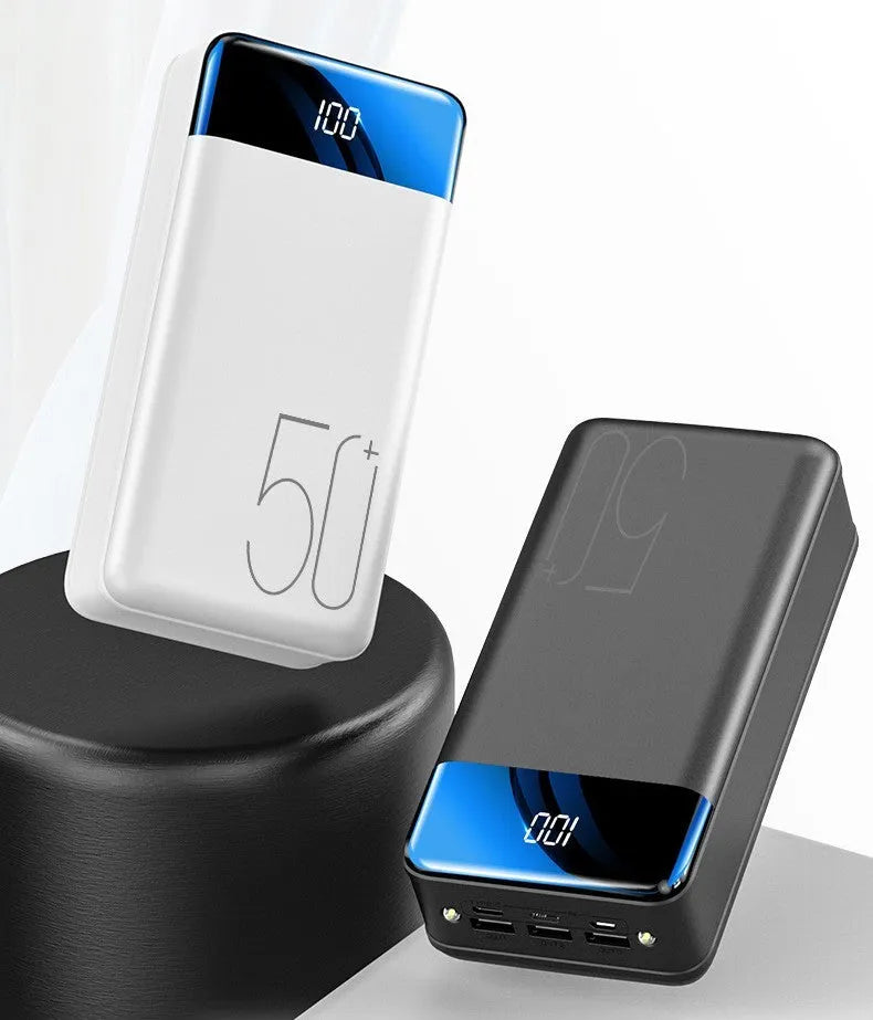 Black large capacity 50000mAh power bank with multiple USB ports on a white background