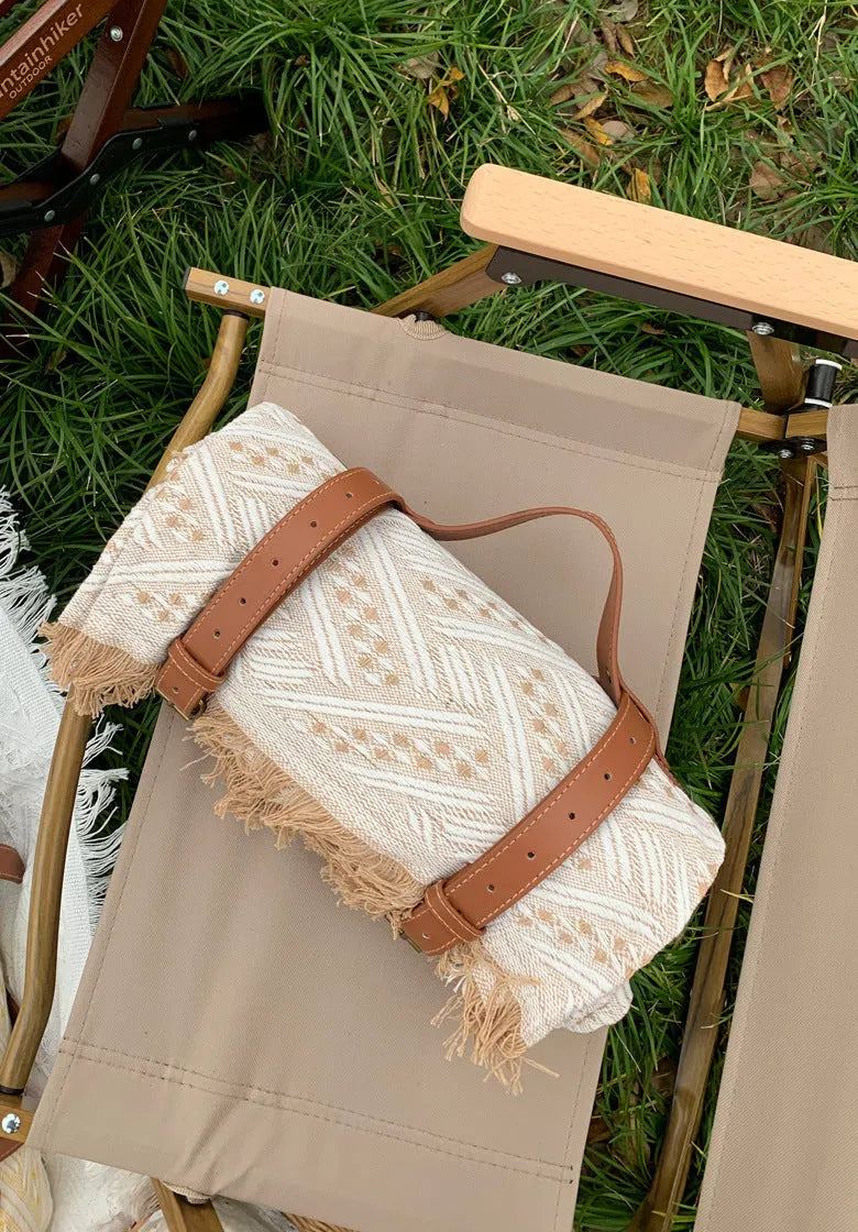 Chessboard plaid knitted picnic blanket with tassel edging and leather handle, acrylic camping rug