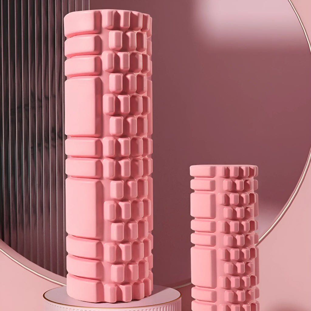 A firm EVA foam roller for fitness and yoga, shown in a selection of colours including black, pink, and sky blue.