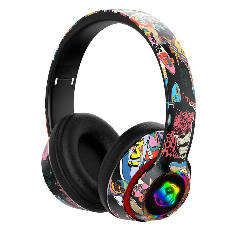 Graffiti wireless Bluetooth headset in black and white colours, shown with features like NFC and wireless charging.