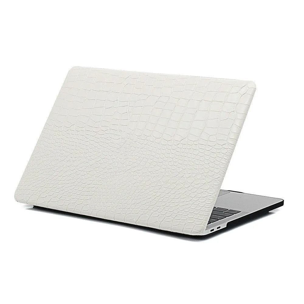 MacBook protective case with crocodile pattern texture and hollowed-out Apple logo in black, white, or soft pink