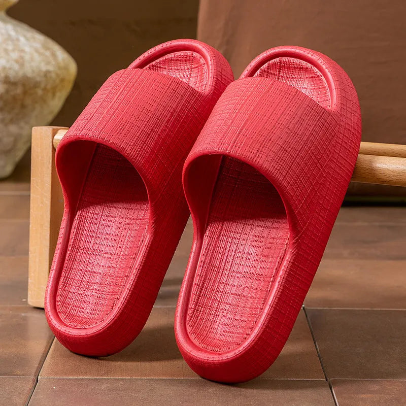 Women's soft EVA non-slip toe ring flip-flop slippers in five colour options.