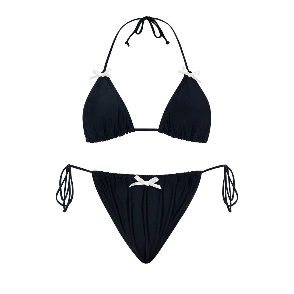 A black women's bikini swimsuit with a bow tie on the front, shown as a set.